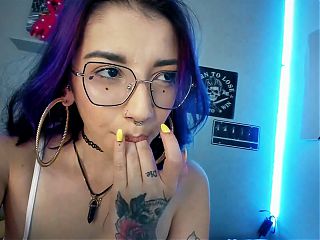 Sexy Colombian otaku with a tattooed body, big tits and a slutty face masturbates intensely with a dildo while moaning